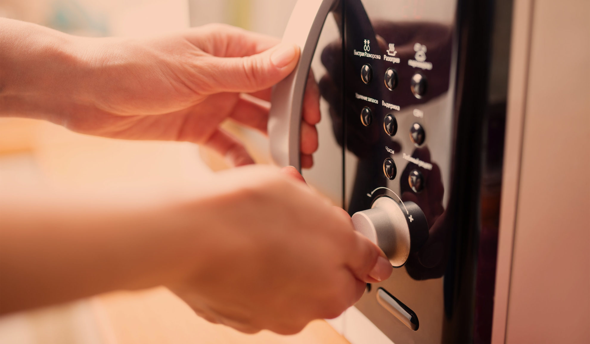 woman-hands-close-up-setting-up-microwave-timer-fort-collins-co